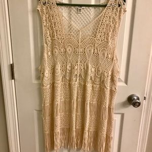 Tan layering top with fringe bottom.